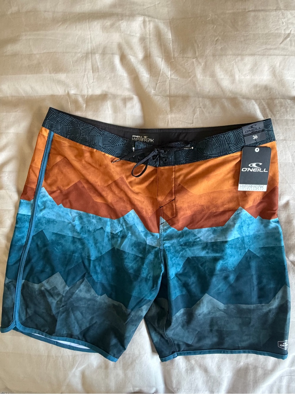O'Neill Orange and Teal Geometric Men's Board Shorts